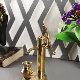 EXIM DECOR Gold-Toned Hand Pump Showpiece-image-98
