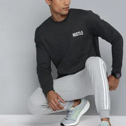HRX by Hrithik Roshan Men Black Solid Sweatshirt image 5