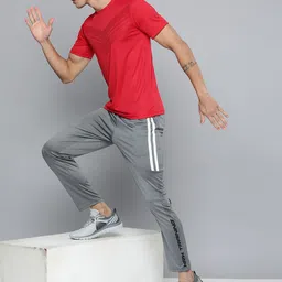 HRX by Hrithik Roshan Men Rapid Dry Training Track Pants With Stripe Tape Detail image 4