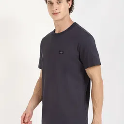 Calvin Klein Jeans Men Solid Round Neck Cotton T-shirt image 5