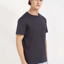 Calvin Klein Jeans Men Solid Round Neck Cotton T-shirt image 3