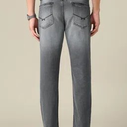 U.S. Polo Assn. Denim Co. Men Tapered Fit Mid-Rise Light Fade Stretchable Jeans image 4