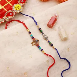 Aatmana Set of 2 Vibrant Evil Eye Peacock & Floral Shaped Rakhi with Roli & Chawal image 1