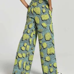 Puma Black & Green Printed Flared Pants image 2