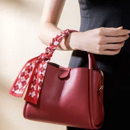 CORSICA Textured PU Half Moon Handheld Bag with Tasselled-image-34