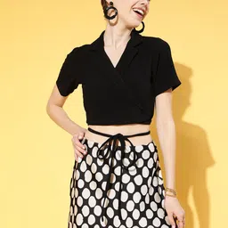 Athena Women Charming Black Solid Midriff Flossing Top image 1