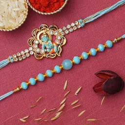 eCraftIndia Set of 2 Kundan-Studded Designer Rakhis with Roli & Chawal image 1