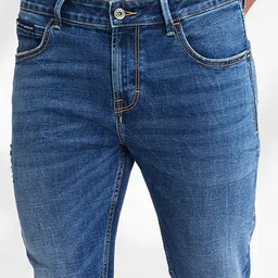 SPYKAR Men Slim Fit Mildly Distressed Light Fade Stretchable Jeans image 5