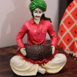 eCraftIndia Green & Pink Polyresin Handcrafted Rajasthani Lady Playing Dholak-picture-42