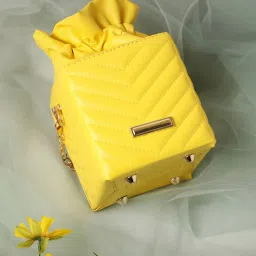 HauteSauce Yellow Textured Small Potli Clutch image 1