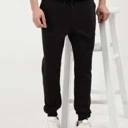Tommy Hilfiger Black Cotton Regular Fit Solid Trackpant image 1