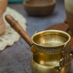 Ambi Exquisite Brass Swing Medium Sized Tea Strainer With Wooden Handle image 1