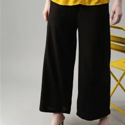 Kryptic Black Flared Fit Mid Rise Pants image 1