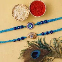eCraftIndia Set of 2 Evil Eye Rakhis for Brothers with Sibling Agreement & Roli Chawal Pack image 2