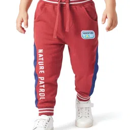 Babyhug Cotton Looper Knit Full Length Track Pant With Nature Patrol Print - Rust Orange-picture-38