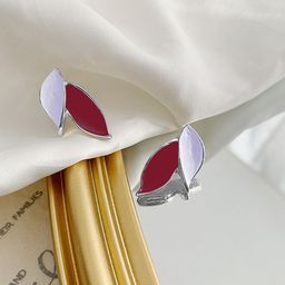 VAGHBHATT Silver-Plated Leaf Shaped Enamelled Studs-picture-2
