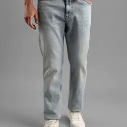 TOMMY HILFIGER Light Blue Mid Wash Slim Fit Mid Rise Jeans-image-81