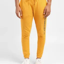 Levi's Mustard Yellow Cotton Regular Fit Logo Printed Joggers-image-10