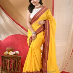 Desh Bidesh Yellow Cotton Solid Saree With Unstitched Blouse Piece image 3