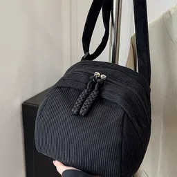 StyleCast x Revolte Structured Sling Bag image 5