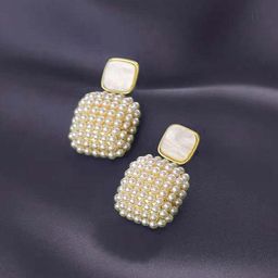 VAGHBHATT Gold-Plated Mother Of Pearls Studded and Pearls Beaded Drop Earrings-picture-23