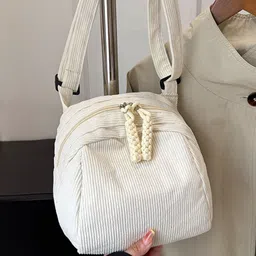 StyleCast x Revolte Structured Sling Bag image 2