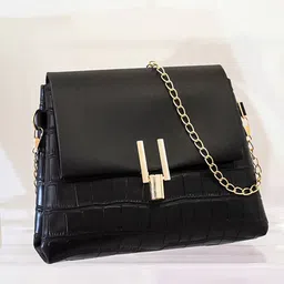 haute sauce by  campus sutra HAUTE SAUCE by Campus Sutra Textured PU Structured Sling Bag with Bow Detail image 1