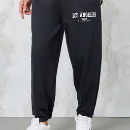 Styli Men Embroidered Mid- Rise Joggers image 1