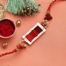 Aapno Rajasthan Red & Silver-Toned Beads with Uncut Coral Jeweled Rakhi Set-picture-27