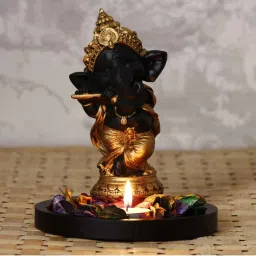 ecraftindia Golden and Black Lord Ganesha Dancing Avatar Showpiece with Base, Fragranced Petals and Tealight image 1