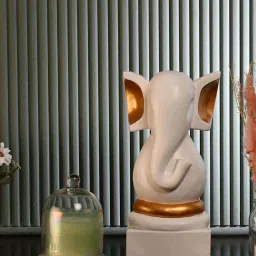 @home White & Gold Polyresin Vighnaharta Ganesha Showpiece image 1