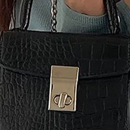 StyleCast x Revolte Textured PU Sling Bag with Cut Work image 5