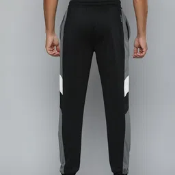 HRX by Hrithik Roshan Men Rapid-Dry Training Joggers With Stripe Detail image 3