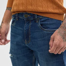 Snitch Men Classic Bootcut Mildly Distressed Light Fade Stretchable Jeans image 3