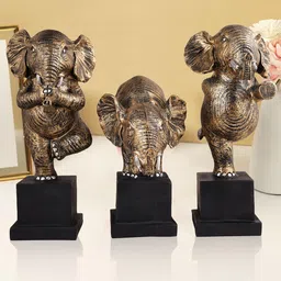 Zart Gold-Toned Idol Showpiece image 1