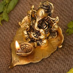 Aura Yellow Textured Metal Lord Ganesha With Diya-picture-43