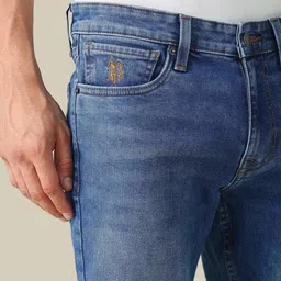 U.S. Polo Assn. Denim Co. Men Tapered Fit Mid-Rise Light Fade Stretchable Jeans image 5