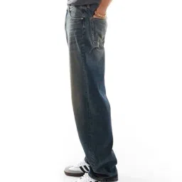 asos design Mid-Wash Vintage Tint Baggy Fit Jeans image 2