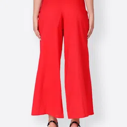 SCORPIUS Women Red Solid Flared Palazzos image 3