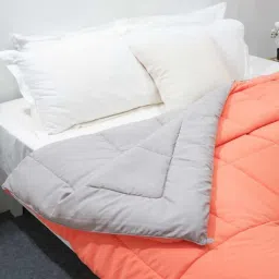 Spaces Silkysoy Solid Coral 90 GSM Microfibre Double Quilt image 4