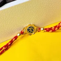 Arte jewels 925 Red and yellow thread rakhi, has gold-toned and blue Om rakhi-image-29