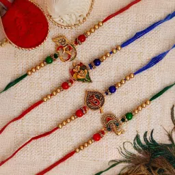 eCraftIndia Set of 4 Multicolor Religious Rakhis with Sibling Agreement & Roli Chawal Pack image 3