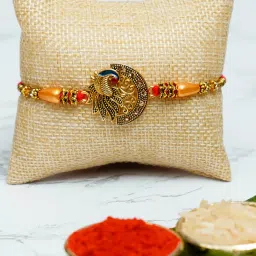 eCraftIndia Assorted Gold Rakhi with Man Showpiece image 3