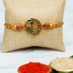 eCraftIndia Assorted Gold Rakhi with Man Showpiece image 3