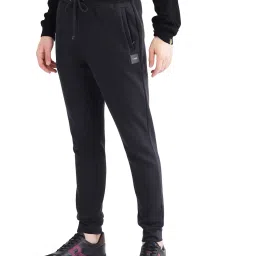 Rare Rabbit Black Regular Fit Solid Trackpants image 4