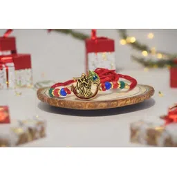 MEIRA JEWELLERY Set Of 2 Designer Rakhis With Greeting Card & Roli Chawal image 2