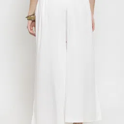 Clora Creation Women Off-White Solid Flared Palazzos image 4