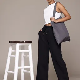 The Roadster Lifestyle Co. Women Textured Loose Fit Trousers-image-9