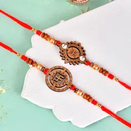 Aapno Rajasthan Set Of 2 Swastik Wooden Beaded Rakhis With Roli Chawal & Greeting Card image 1