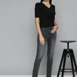 levi's Women's 711 Black Skinny Fit Mid Rise Jeans image 1